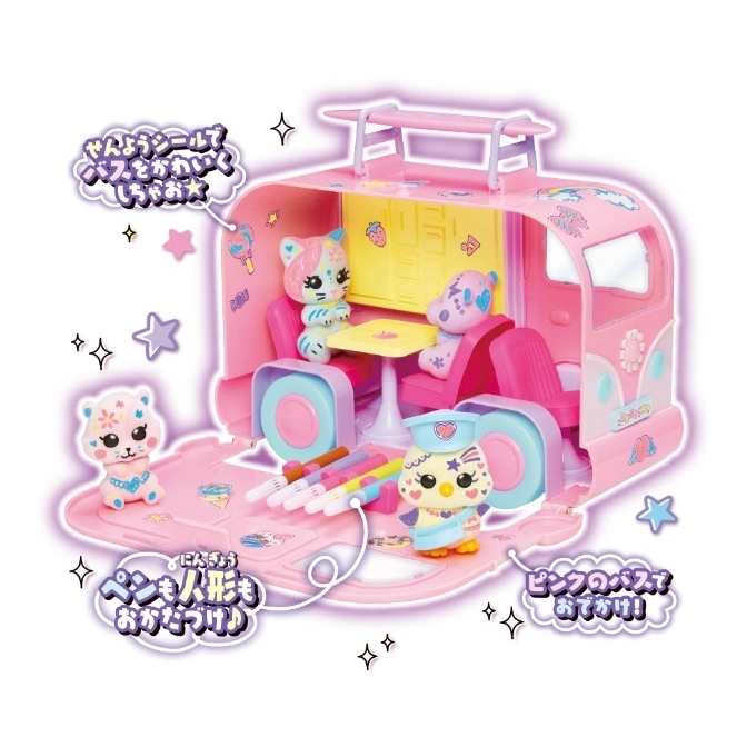  Pink toy campervan playset with animal figures, table, chairs, and art supplies.