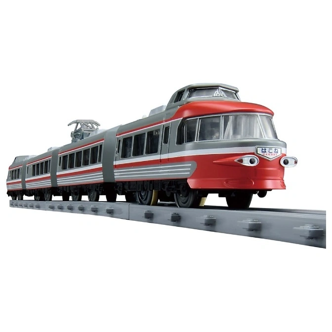  Red and gray toy train on gray track. The train has multiple cars and a distinctive front design.