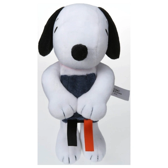  Snoopy plush toy with black ears, nose, and a dark blue shirt holding black and orange ribbons.