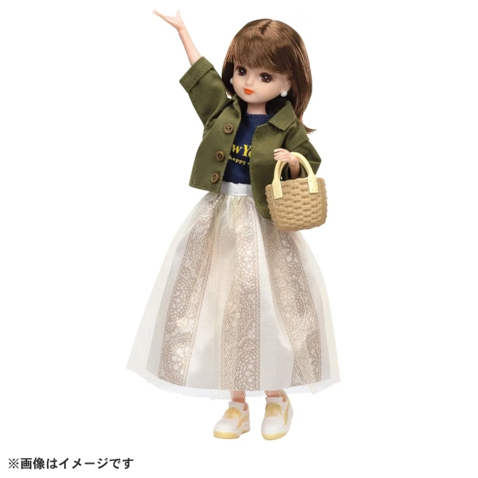  Licca doll in a green jacket, skirt, and sneakers, holding a basket.