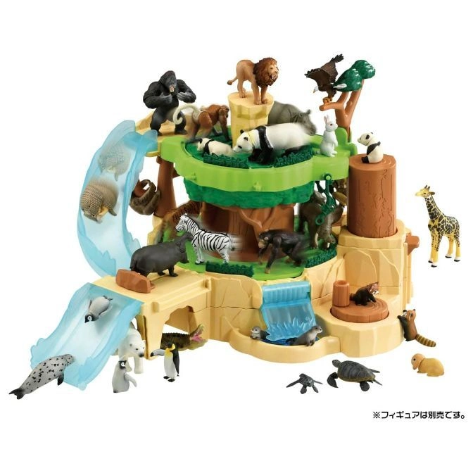 Animal playset with slides, waterfall, and various toy animals like lions, pandas, and penguins.