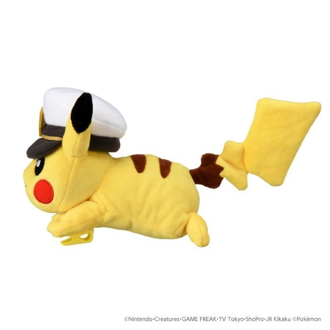  Pikachu plush toy wearing a captain's hat, lying down.