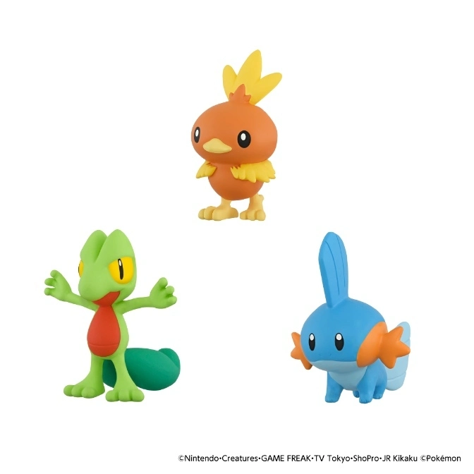  Three Pokémon figures: Treecko, Torchic, and Mudkip, standing on a white surface.