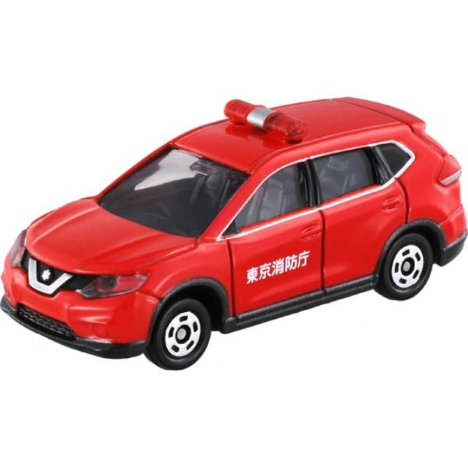 Red toy fire engine car with Japanese text. Miniature diecast vehicle.
