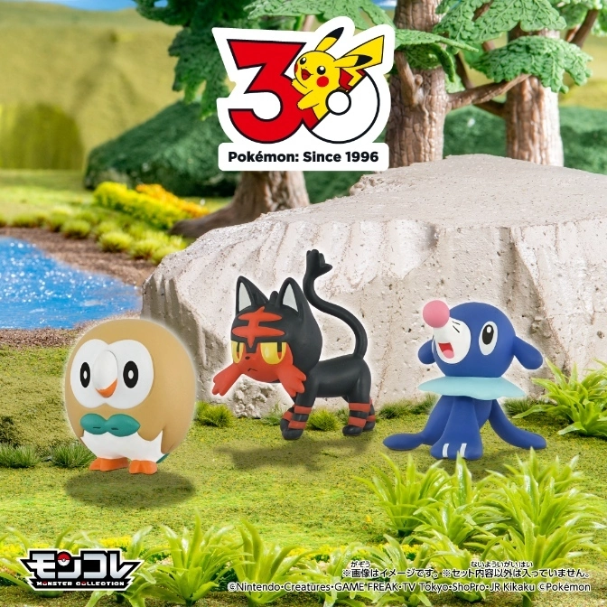  Pokémon toys: Rowlet, Litten, and Popplio figures on a grassy field with a 30th anniversary logo in the background.