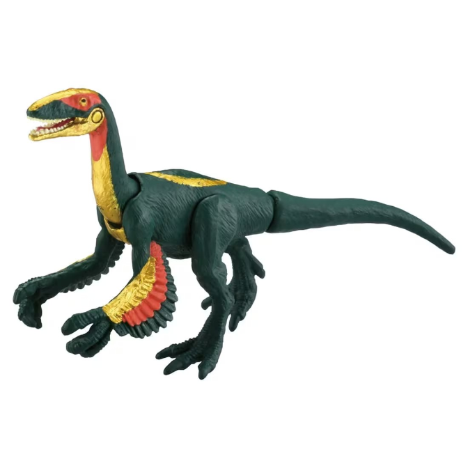 Green dinosaur toy with red and gold accents, standing on a white background.
