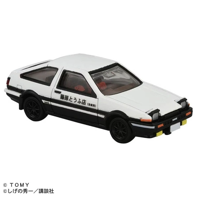  White Toyota AE86 toy car with black trim, pop-up headlights, and Japanese text on the side.