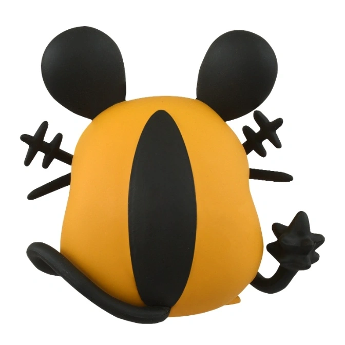  Orange and black toy figure with round ears and star-shaped hands.