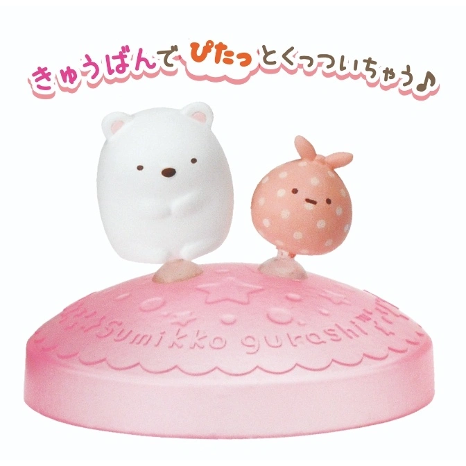  Sumikko Gurashi toy featuring a white bear and pink polka-dot character on a pink base.