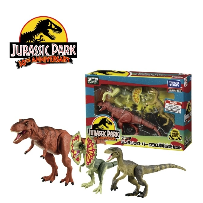 Jurassic Park 30th Anniversary toy set with T-Rex, Dilophosaurus, and Velociraptor figures and packaging.