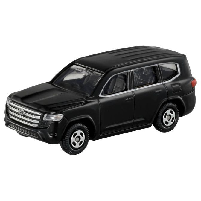 Black toy SUV car with detailed wheels and silver grill.