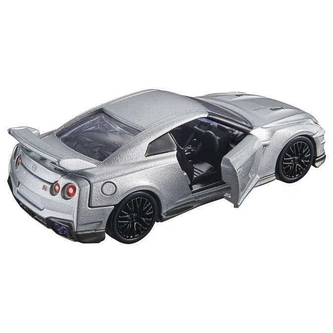  Silver toy Nissan GT-R with an open door, showcasing the interior.