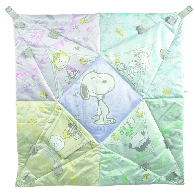  Snoopy-themed patchwork play mat with character designs and height chart, secured with grey straps.