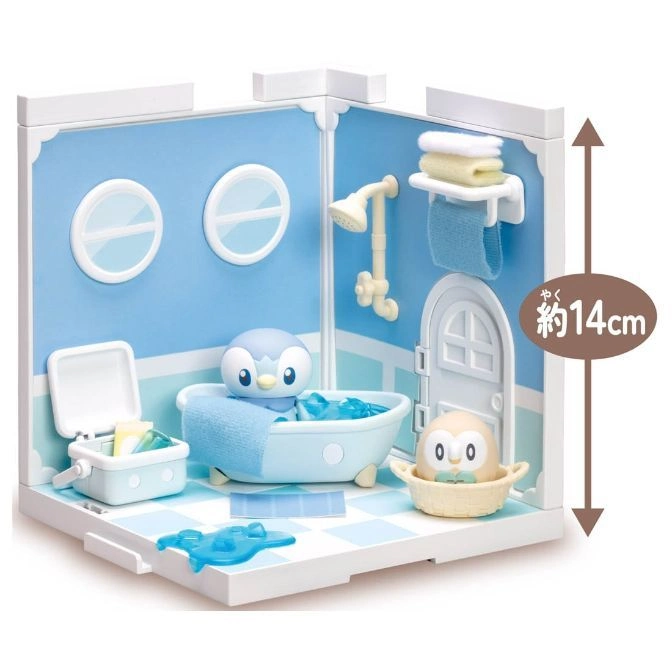  Toy bathroom playset with Piplup figures in a tub and basket, plus accessories like a shower and towels.