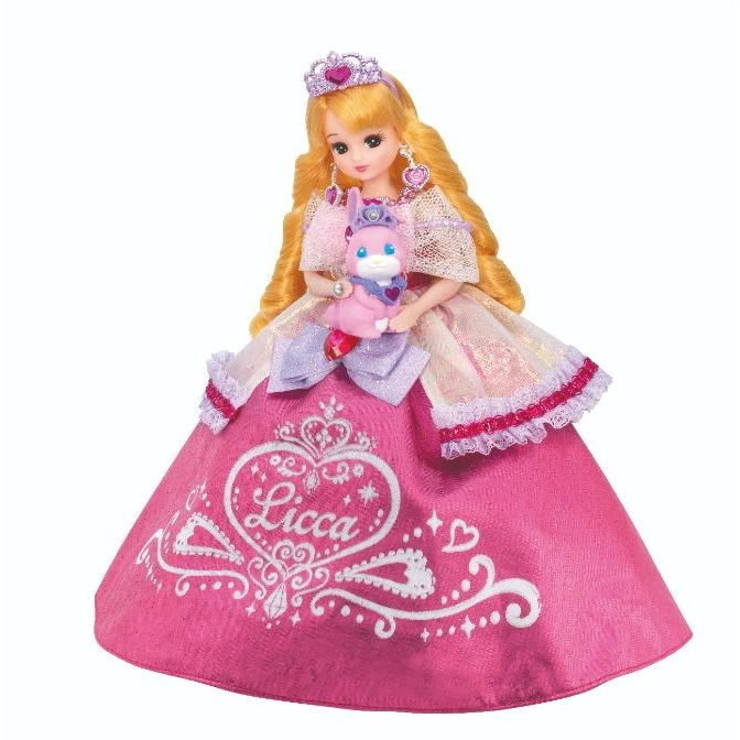  Licca doll in pink gown holding a bunny plush toy, wearing a crown and heart earrings.