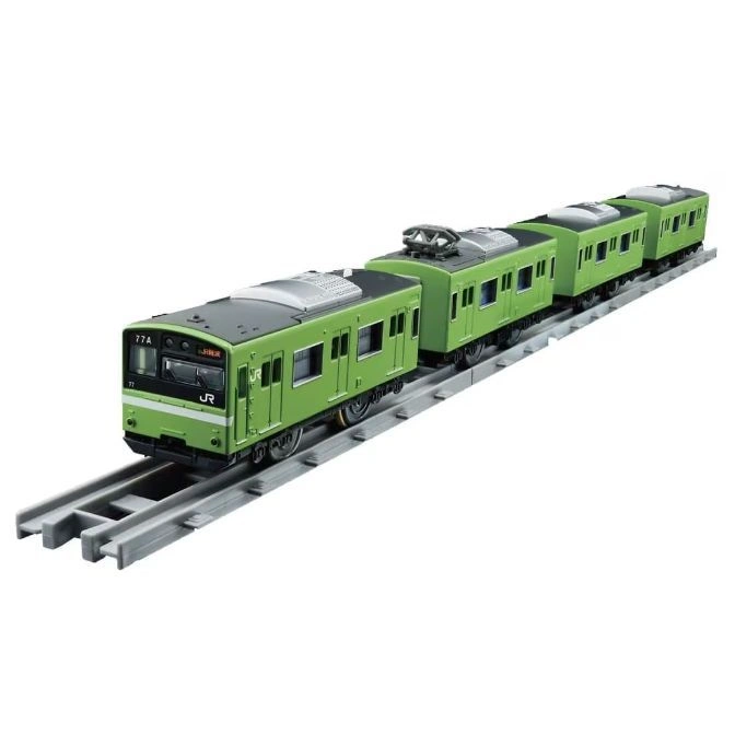 Green toy train with multiple cars on a gray track.