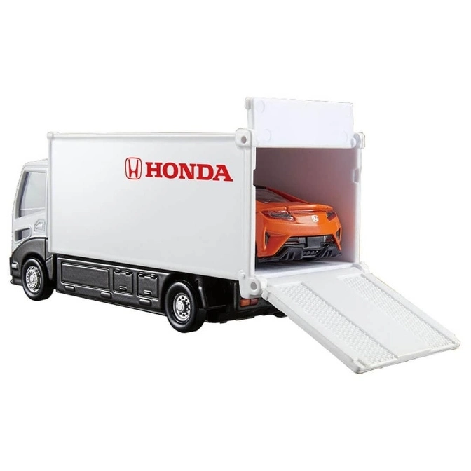  Honda truck toy carrying an orange sports car with ramp extended.