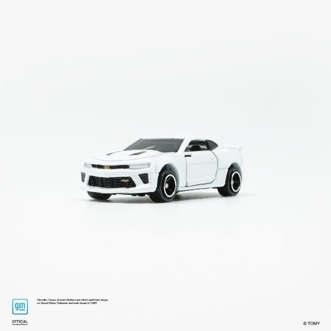 White toy Chevrolet Camaro with black wheels.