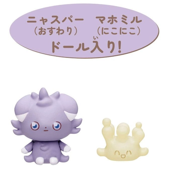  Espurr and Alcremie toy figures, Espurr is purple and Alcremie is cream-colored.