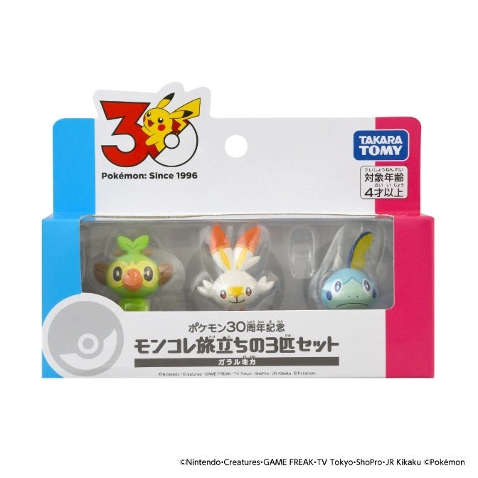 Pokémon 30th Anniversary Moncolle set featuring Grookey, Scorbunny, and Sobble figures in a box.