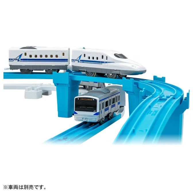  Toy train set with two trains on different levels of a blue track.