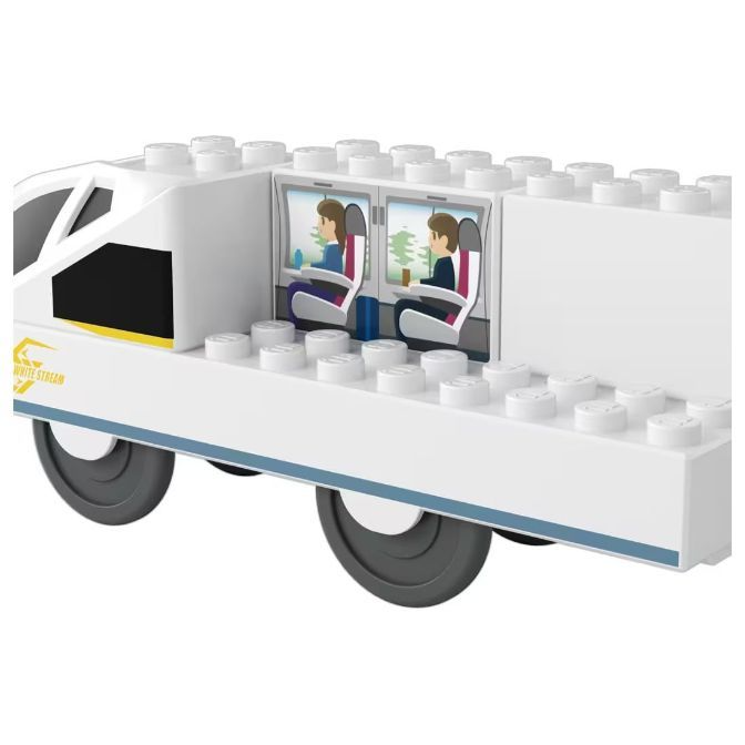  Toy train with passenger cabin and "White Stream" logo, made of interlocking plastic bricks.