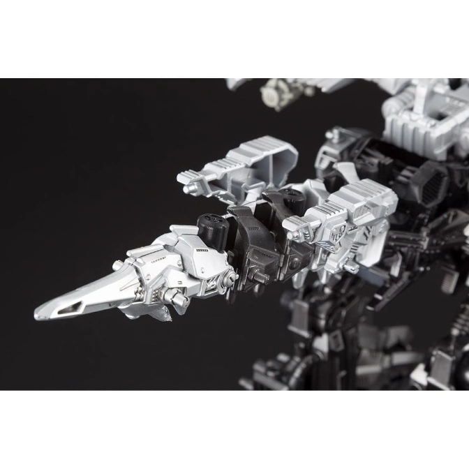  Silver and black robot toy with pointed drill arm attachment.