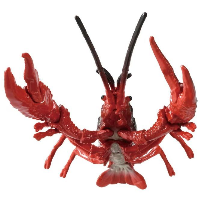  Red toy crawfish with large claws and antennae, posed upright on a white background.