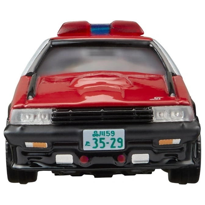  Red toy car with a Japanese license plate and a red light bar on top.