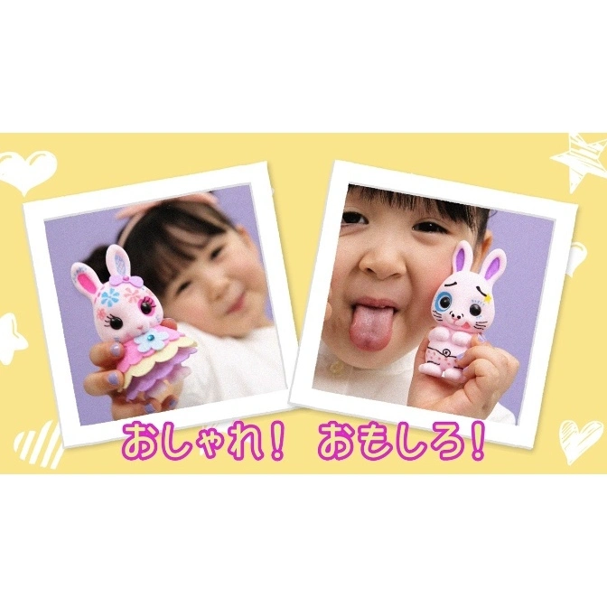  Two toy bunnies held by children. One is pink with a dress, the other has silly face details.