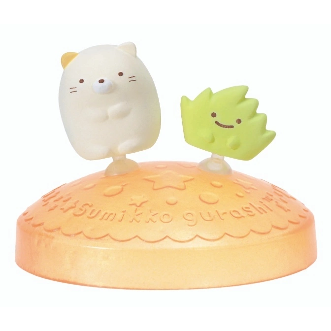  Sumikko Gurashi toy featuring Shirokuma and a green Zassou figure on an orange base.