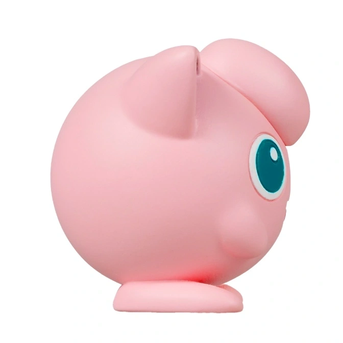  Pink Jigglypuff toy with big blue eyes and curled hair.