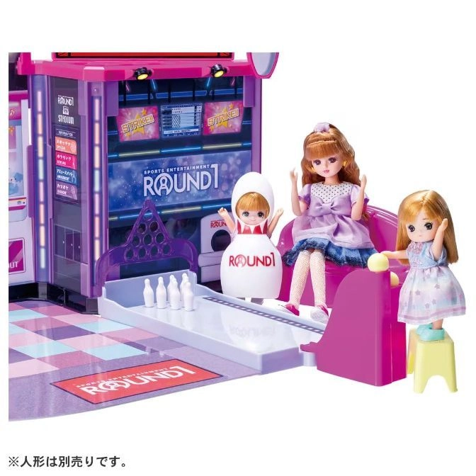  Toy bowling alley with 3 dolls, pins, and a bowling ball. The set features a pink and purple arcade theme.