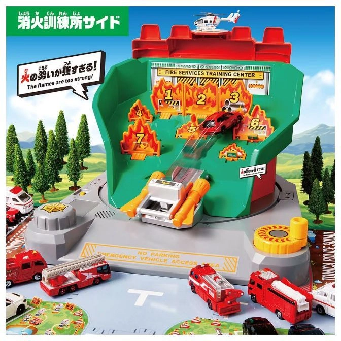  Tomica fire station playset with toy cars, helicopter, and simulated fire training course.