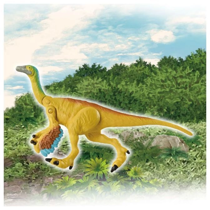  Yellow dinosaur toy with brown and blue feathers standing in a grassy area.