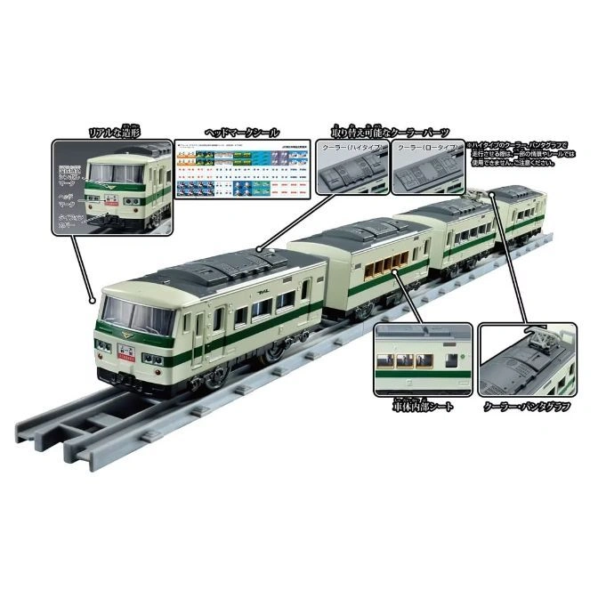  Toy train set with multiple cars, detailed features, and accessories on a gray track.