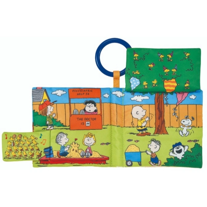  Peanuts soft book with Snoopy, Charlie Brown, and Lucy characters playing in a park.