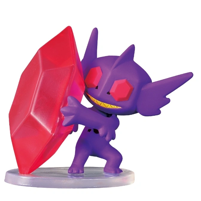  Purple Sableye toy holding a large red gem.