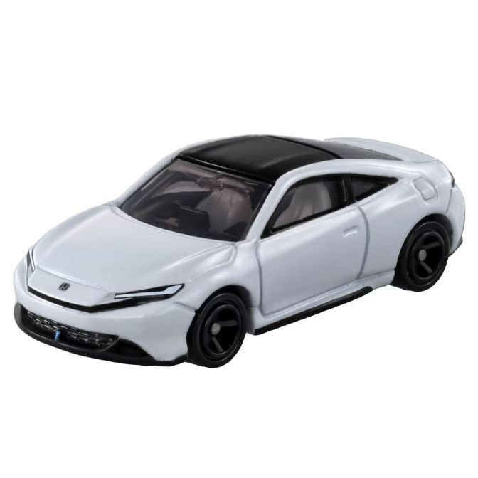 White toy car with black roof and wheels.