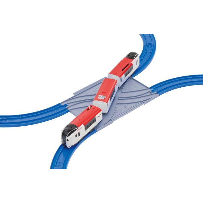  A toy train set with a red and white train on blue tracks.