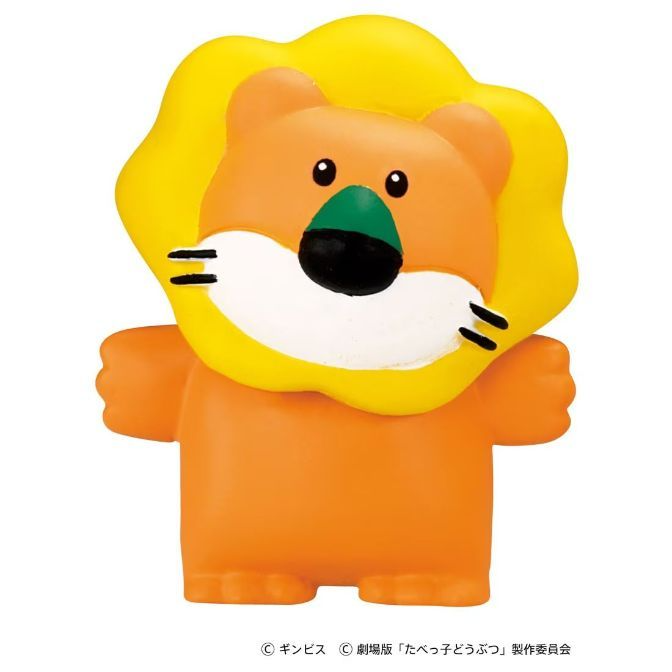 Cartoon lion toy with yellow mane, orange body, and black and green nose.