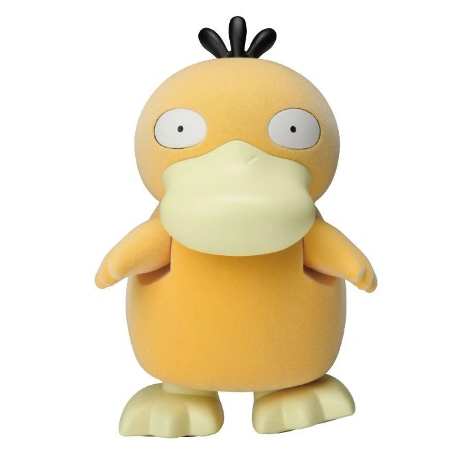 Psyduck toy figure with yellow body, cream-colored bill and feet, and three black hairs.