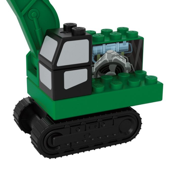  Green toy excavator with black treads and cab, featuring a detailed engine compartment.