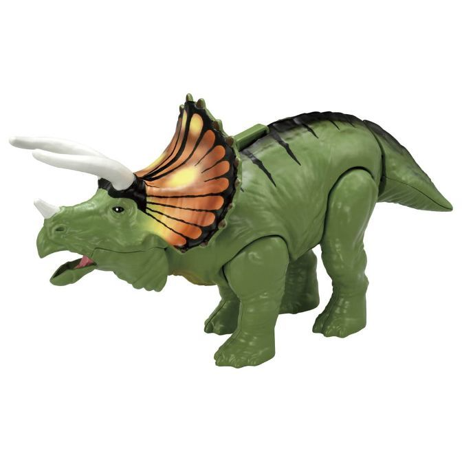 Green Triceratops toy with orange frill and white horns.