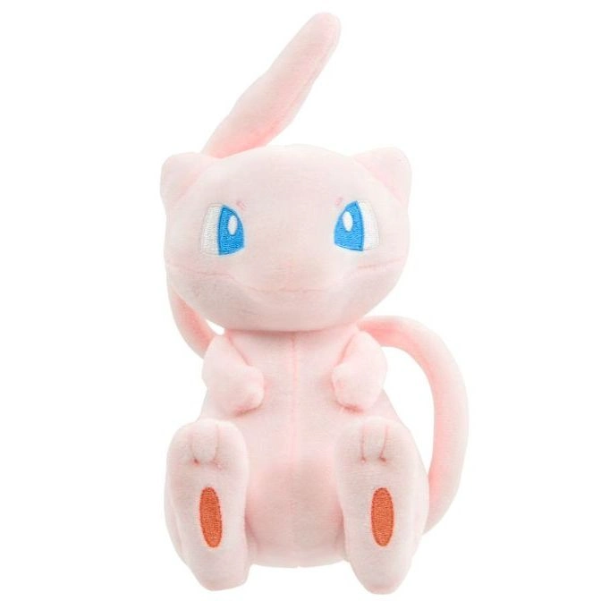Pink Mew plush toy with blue eyes and orange paw pads.
