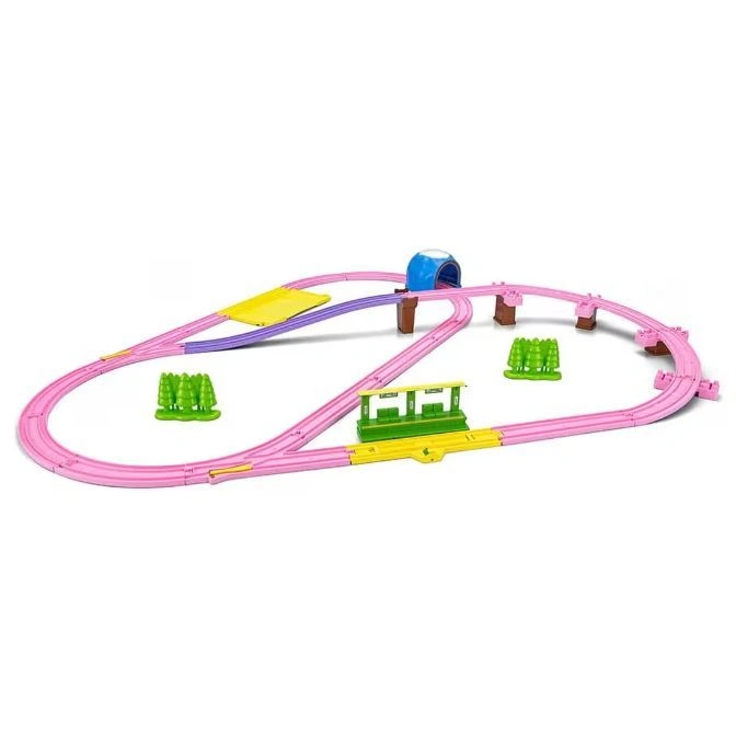 Pink toy train set with track, tunnel, station, bridge, and trees.