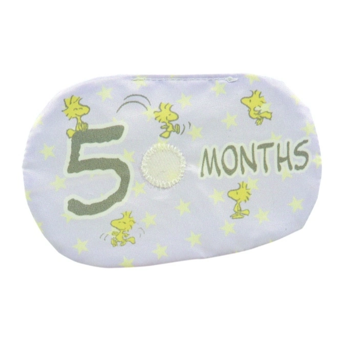  5 months baby eye mask with Woodstock and stars pattern.