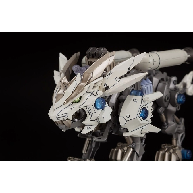  White robotic lion toy with green eyes and blue accents.