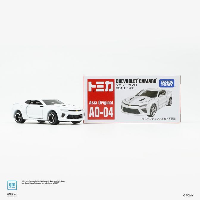  White Tomica Chevrolet Camaro toy car, Asia Original AO-04, scale 1/66, with suspension and opening doors.