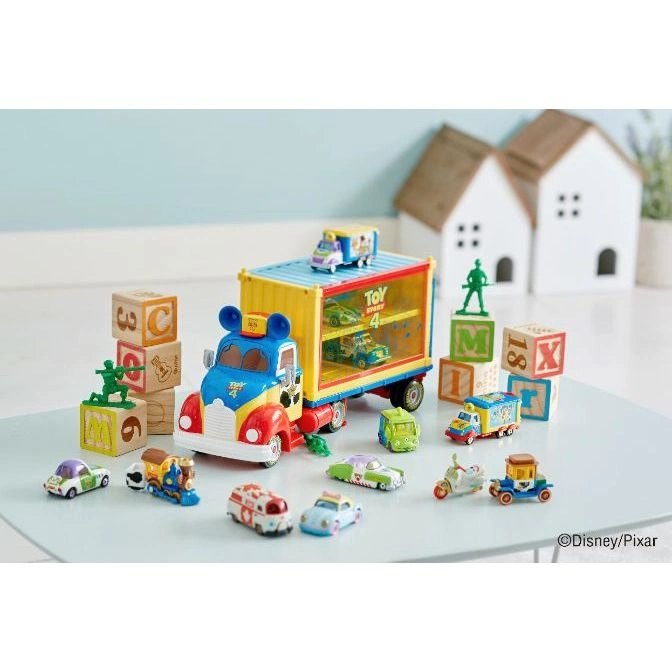 Toy Story 4 truck with miniature cars and blocks. A colorful and playful scene.